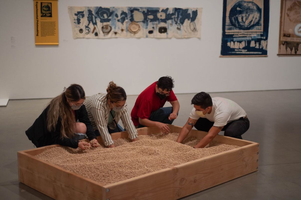 Alison Knwoles attends the opening of  her "Celebration Red"  installation at BAMPFA, July 23 th. 