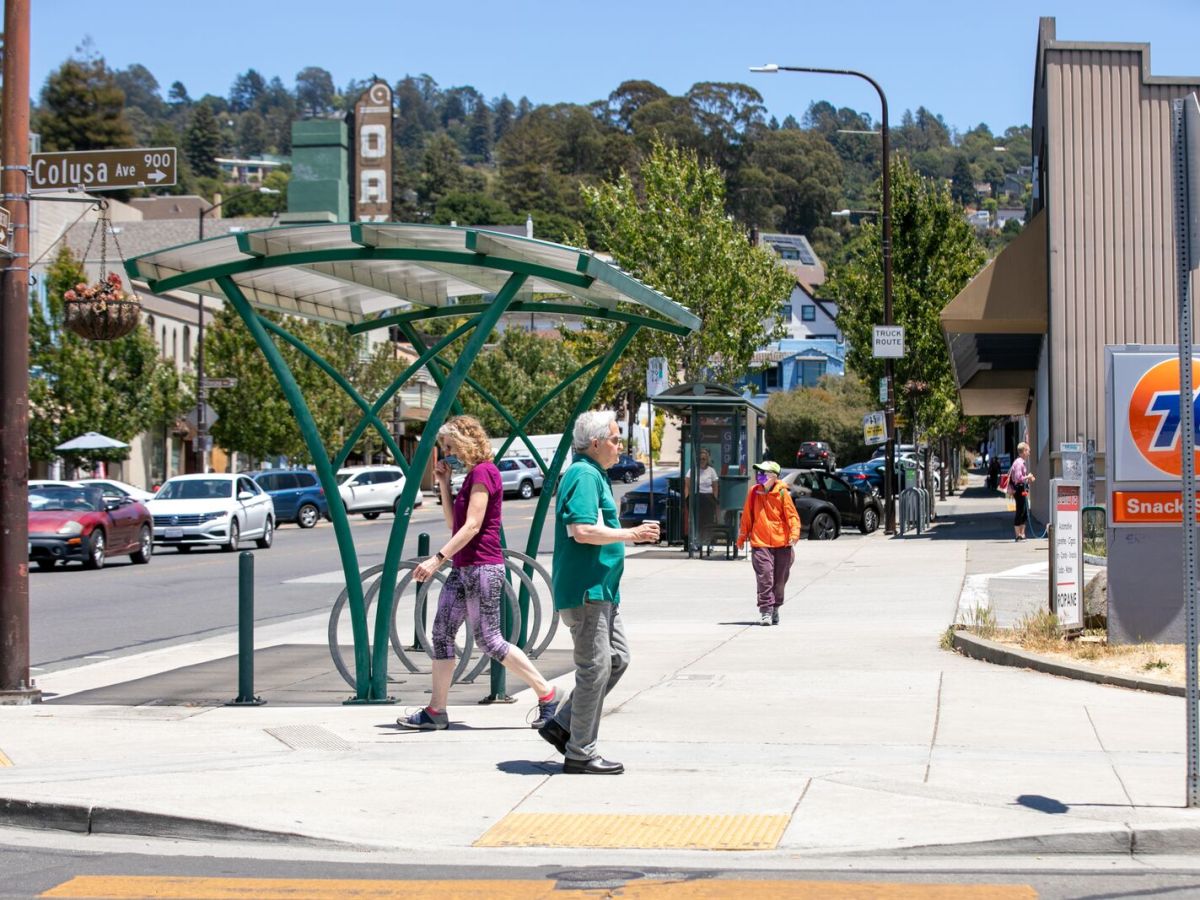 People walk at the intersection of Solano and Colusa avenues in North Berkeley