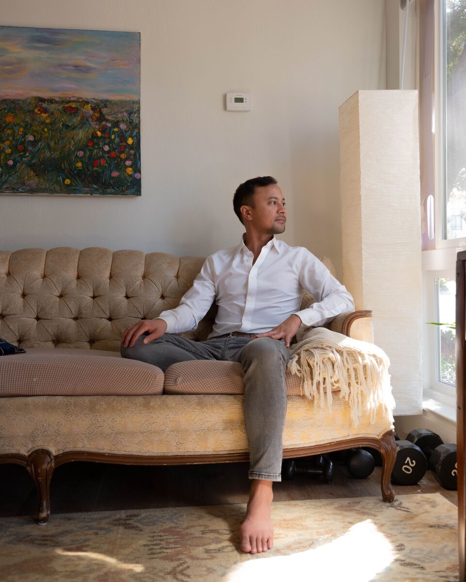 Greg Magofña, a housing activist who dropped out of the race for Berkeley City Council, poses for a portrait inside his home.