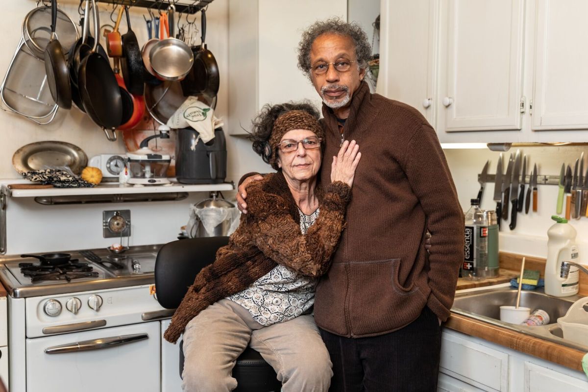 Susana Witte and husband Ralph Nelson pose for a photo in their Berkeley home on February 2, 2022. Credit: Kelly Sullivan