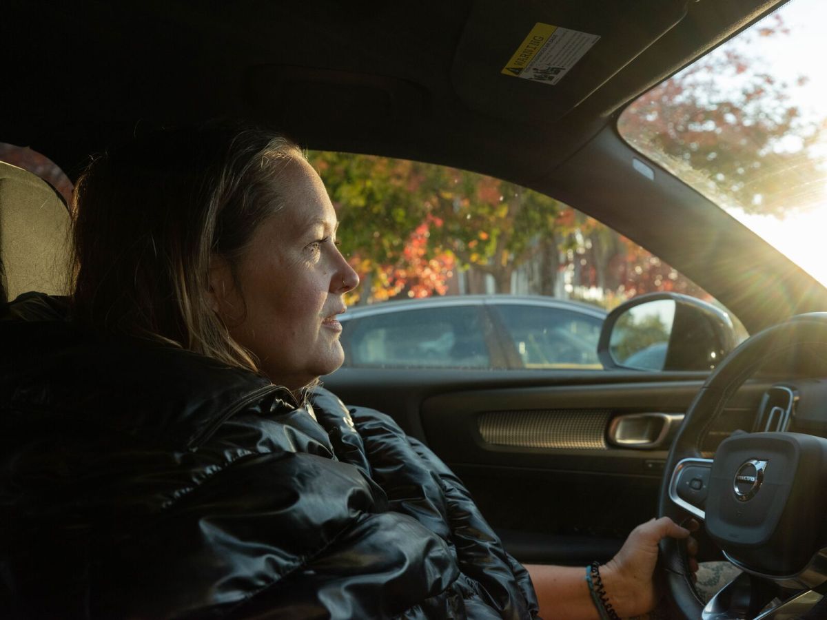 Lindsey Turrentine sits at the wheel of her car during a morning commute.
