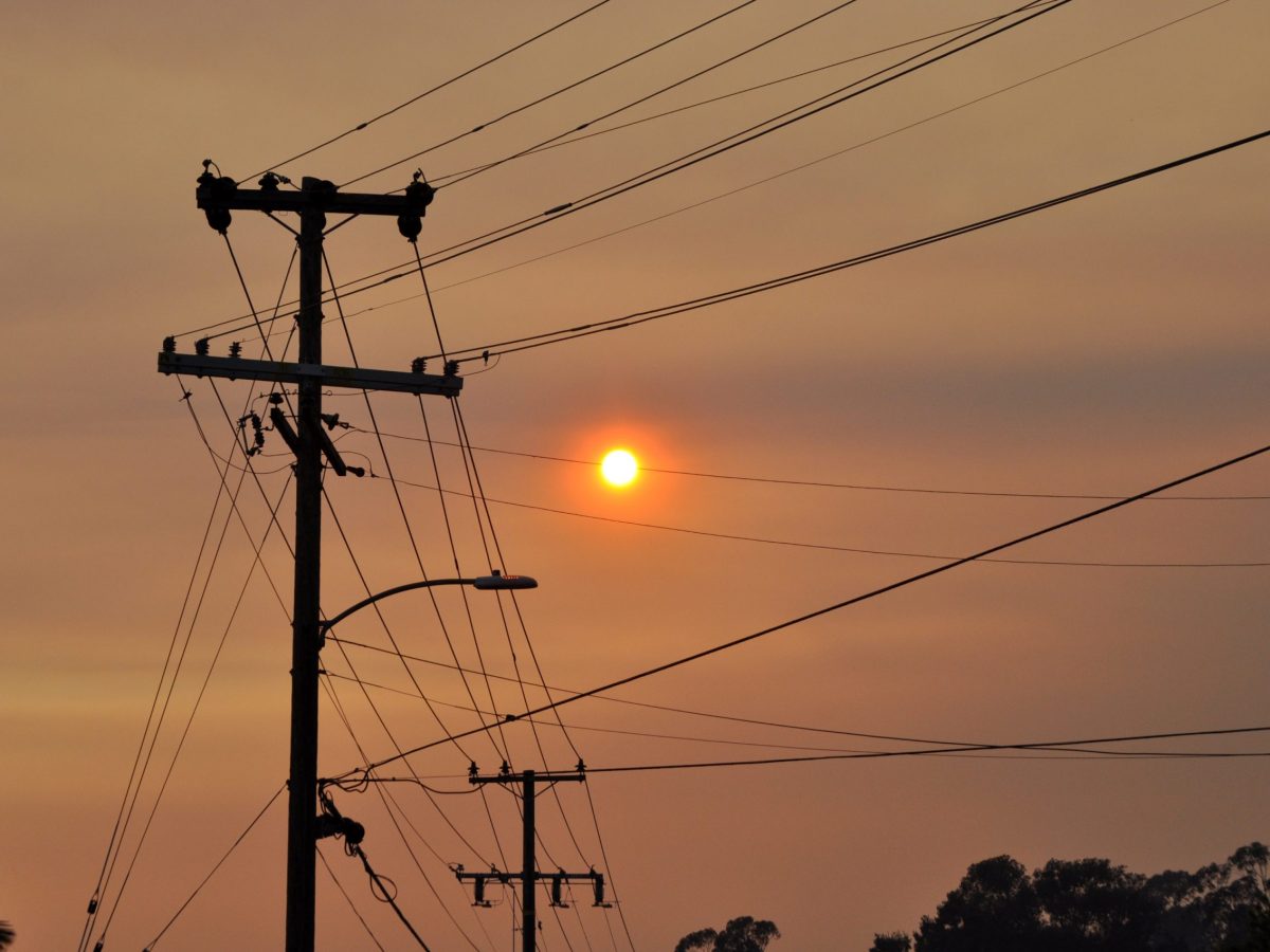 Power lines against a smoke-filled sky in Oakland